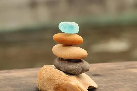 Tiny rock pebbles balancing Stock Photos