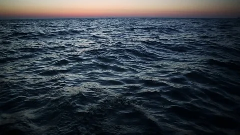 Tiny rough waves. Dark blue water Stock Footage 75615967