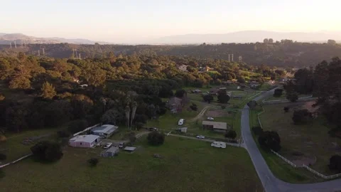 Tiny rural town of Prunedale on sunny day, aerial flying over view Video stock 171377137