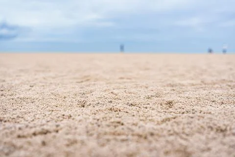 Tiny sand balls created by crabs scattered on tropical beach at low tide Foto stock