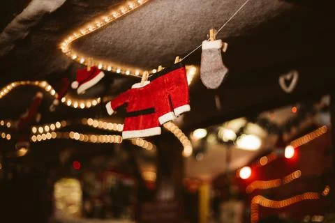 Tiny santa clothes drying on a rope Stock Photos