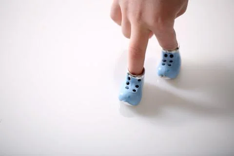 Tiny shoes Stock Photos