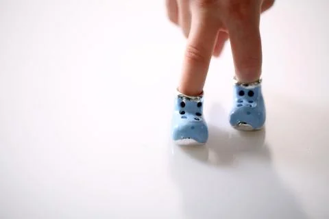Tiny shoes Stock Photos