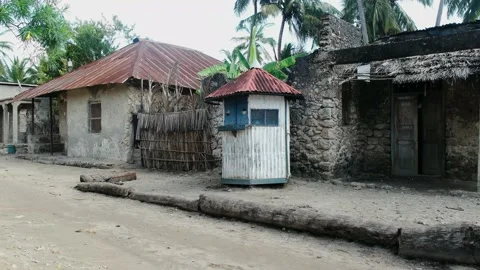 A tiny shop infront of an old house Stock Footage 163982767