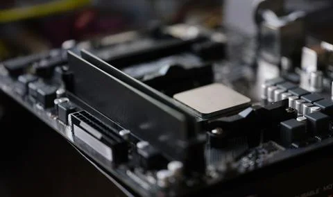 Tiny silver detail in computer processor, computer motherboard with all 写真素材