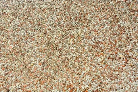 Tiny stones wall background Stock Photos