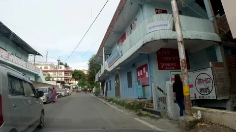 Tiny streets of Himalayan town village with small grocery shop market and local  Video stock 273384267
