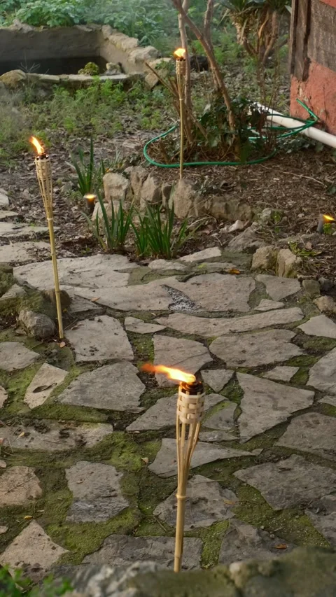 Tiny Torches on a Stone Pathway, Glowing Lights Stock Footage 303345970