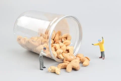 Tiny toy mining nuts with bottle Foto stock