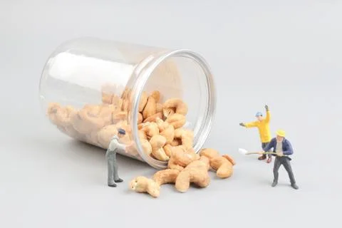 Tiny toy mining nuts with bottle Foto stock