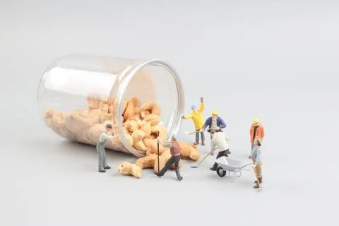 Tiny toy mining nuts with bottle Foto stock