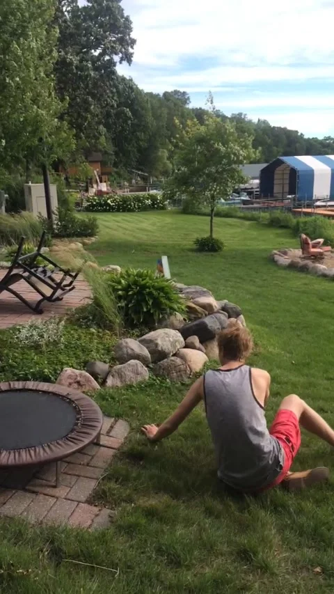 Tiny Trampoline Take Down, Mound, Minnesota, USA - 20 Jun 2016 Stock Footage 205419032