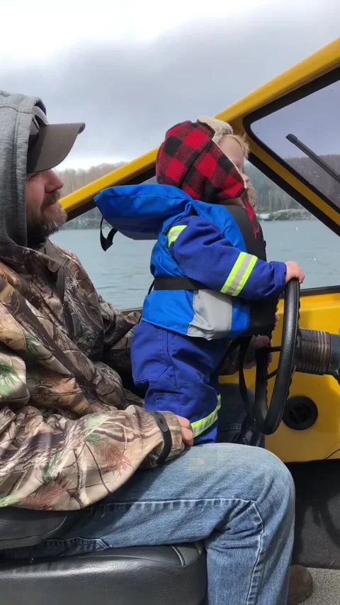 Tiny Tyke Enjoying First Boat Ride of Spring, Alberta, Canada - 24 Apr 2019 Stock Footage 205222307