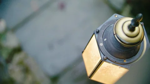 Tiny water droplets fall from old fashioned outdoor house lantern on a rainy day Stock Footage 100232586