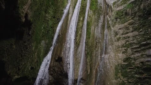 Tiny Waterfall Cascading Over Mossy Rocky Ledge In Canyon Stock Footage 310229363
