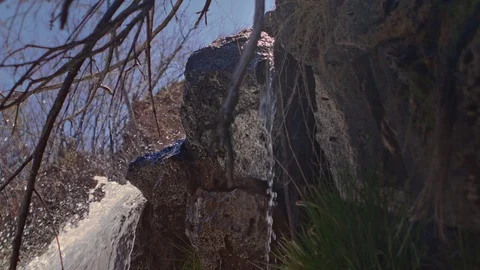 Tiny Waterfall next to Big waterfall Slow Motion Stock Footage 88869321