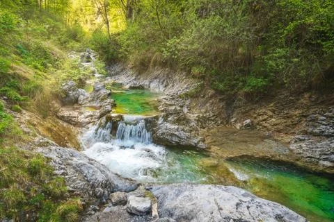 Tiny waterfall at the Vertova Torrent Foto stock