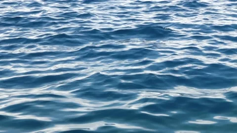 Tiny waves on the calm sea. The surface of the sea is very smooth. Blue clear 스톡 동영상 153742490