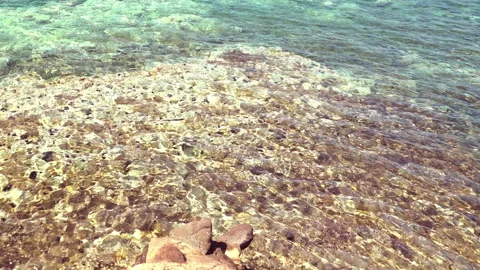 Tiny waves at the seaside Видео 259060412