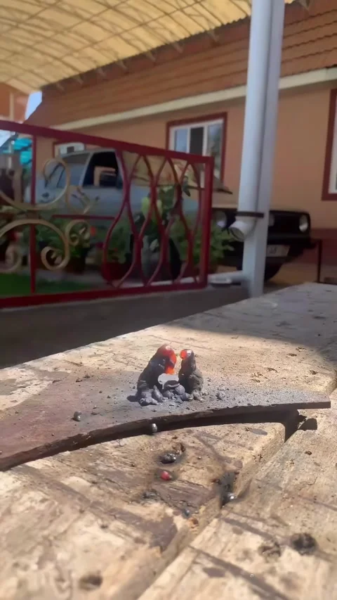 Tiny Welder Holds Up a Giant Steel Beam, Karakol, Kyrgyzstan - 16 Aug 2026 Stock Footage 345757633