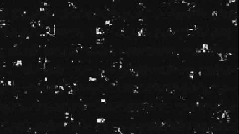 Tiny white particles floating in dark space during subtle camera movement w.. Video stock 340915302