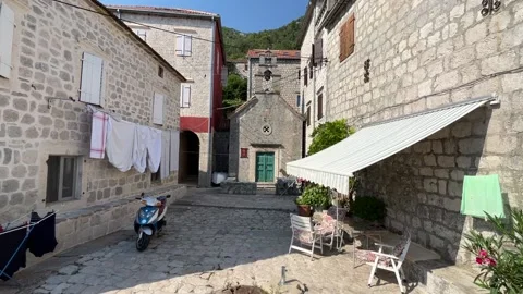 Tiny yard in a medieval city of Montenegro Stock Footage 239779833