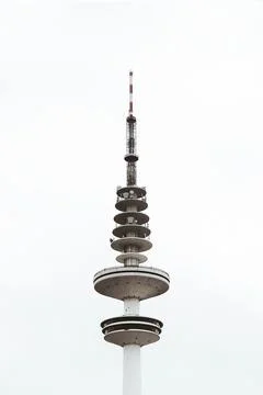 The tip of a communications tower in Hamburg against a white sky Stock Photos