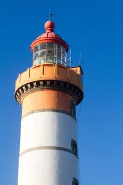 Tip of a lighthouse in a beautiful day Stock Photos