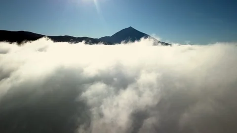 The tip of the mountain and the white clouds Stock Footage 87632364