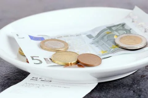 Tip on a restaurant table Stock Photos