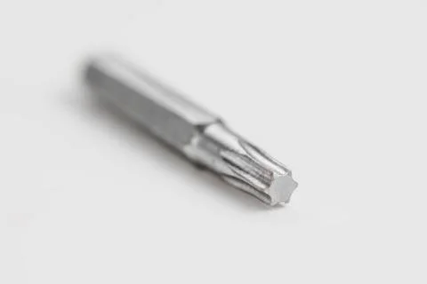 Tip on a screwdriver star shaped close up. Stock Photos