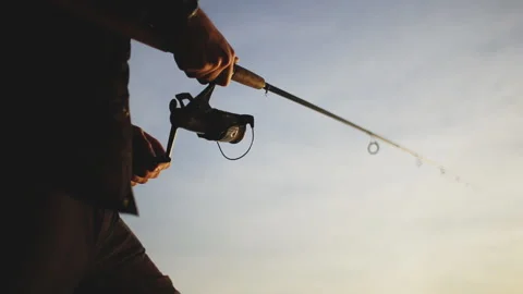 The tip of the spinning when catching predatory fish. Fishing on a wobbler. Stock Footage 97472572