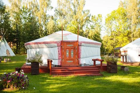 Tipi dwelling, Yurt in the forest. Stock Photos