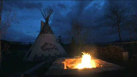 Tipi with Fire at Dusk Stock Footage