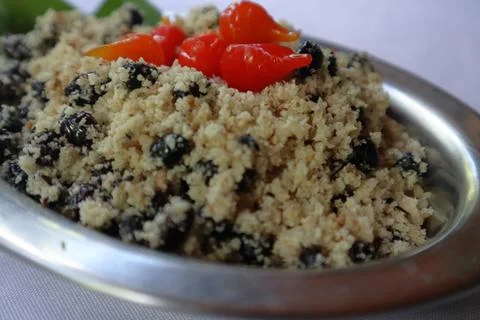 Tipical ant with cassava flour, also known as ica, indigenous meal typical of Stock Photos