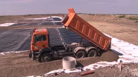 Tipper truck dumping ground 스톡 동영상 62294575