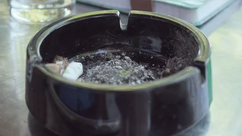 Tipping Ash From Cigarette Into Ashtray Video stock 89683287