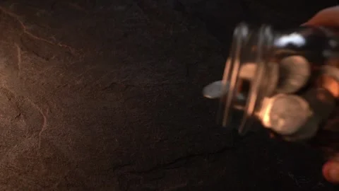 Tipping coin jar - dark background Stock Footage 288494159
