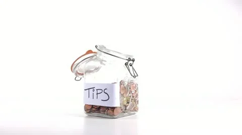 Tips and coins Stock Footage 21763582
