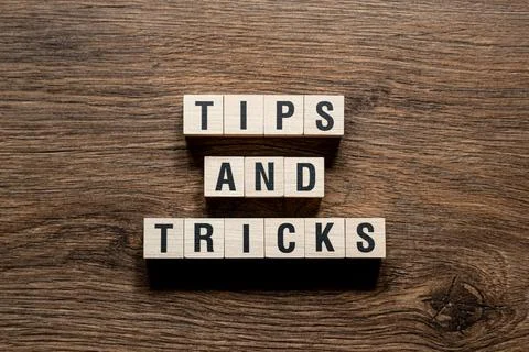 Tips and tricks - word concept on building blocks, text Stock Photos