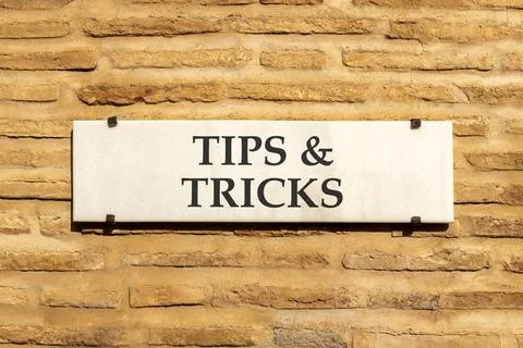 Tips and tricks words symbol. Concept words Tips and tricks on beautiful wh.. Stock Photos