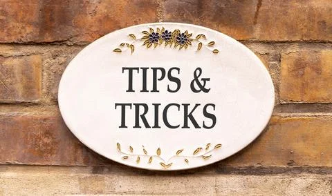 Tips and tricks words symbol. Concept words Tips and tricks on beautiful wh.. Stock Photos