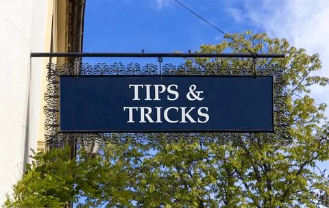 Tips and tricks words symbol. Concept words Tips and tricks on beautiful bl.. Stock Photos