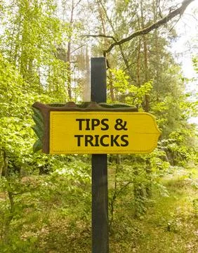 Tips and tricks words symbol. Concept words Tips and tricks on beautiful ye.. Stock Photos
