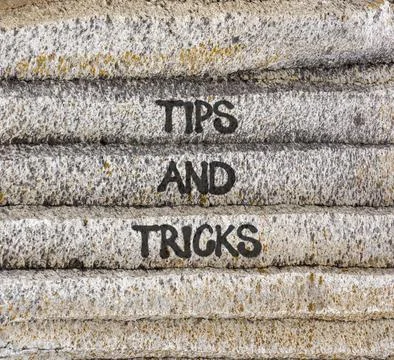 Tips and tricks words symbol. Concept words Tips and tricks on beautiful gr.. Stock Photos