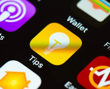 Tips app icon on Apple iPhone screen Stock Photos