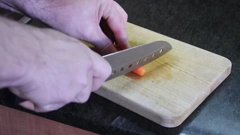 Tips for slicing vegetables efficiently in the kitchen Stock Footage 294623023