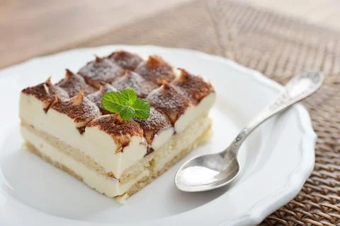 Tiramisu cake with mint Stock Photos