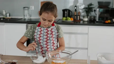 Tiramisu making process in the kitchen- little girl making Italian desert with c Stock Footage 246012287