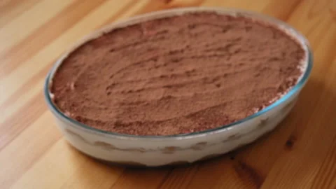 Tiramisu is on the table in the kitchen. Video stock 196853972